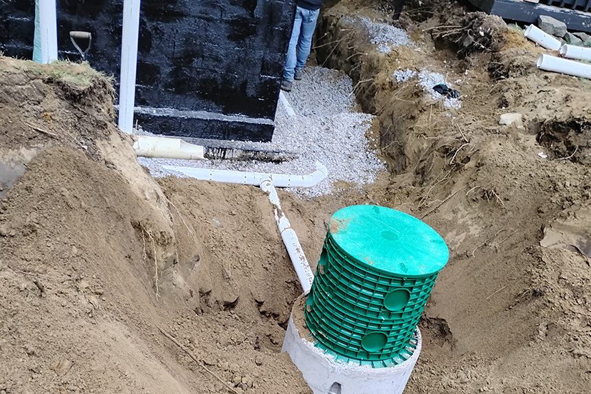 Installation d'un drain de fondation Lac St-Charles.